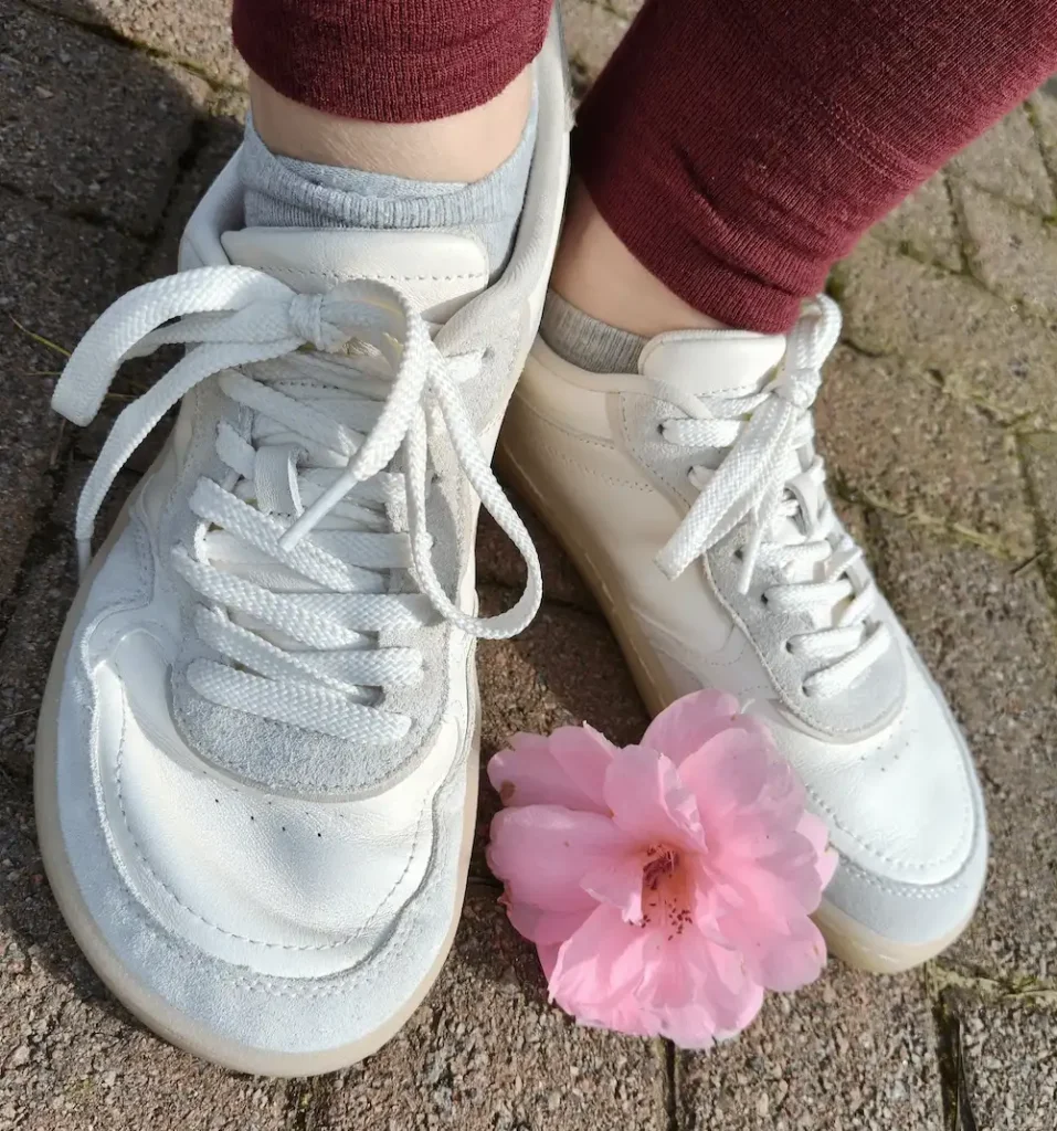 Barefoot trainers being worn